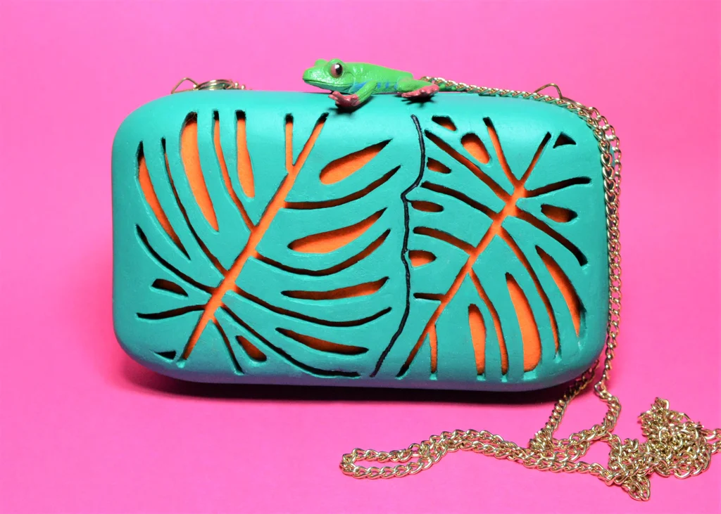 حقيبة يد كلاتش مطبوعة ثلاثية الأبعاد على شكل ورقة نبات المونستيرا